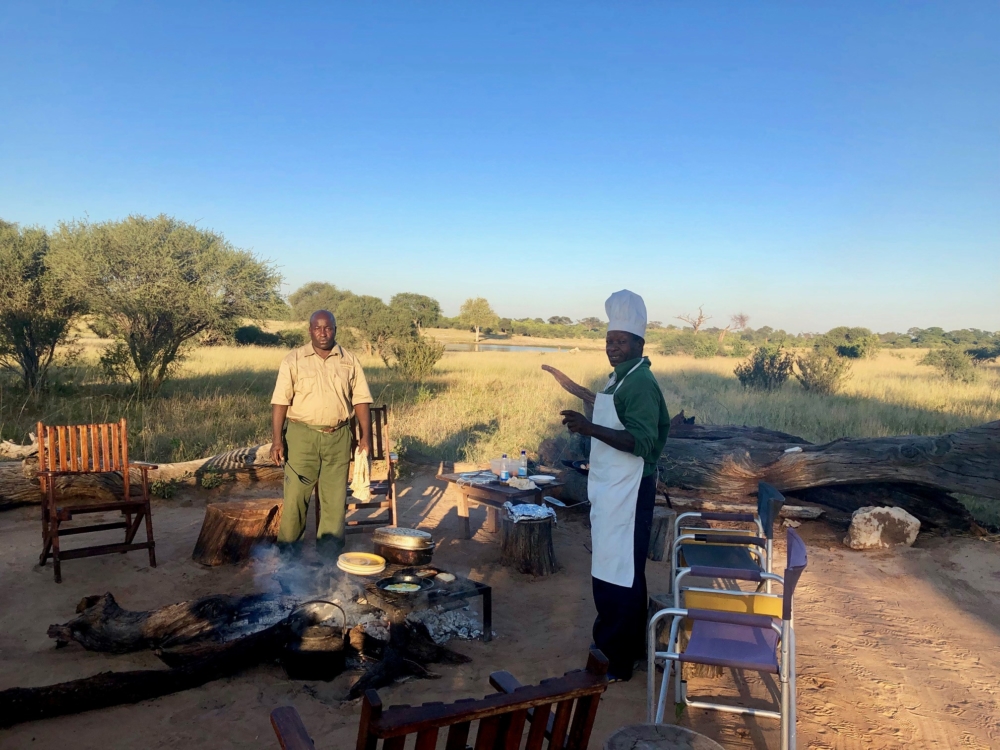 Jozibanini, cooking on an open fire, Hwange NP